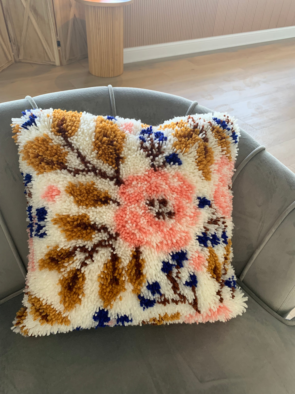 Handmade crochet pillow by CommuniCare Client