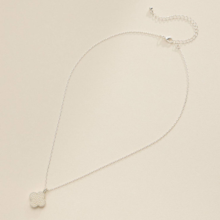 Silver Pendant Necklace with Delicate Beaded Accents